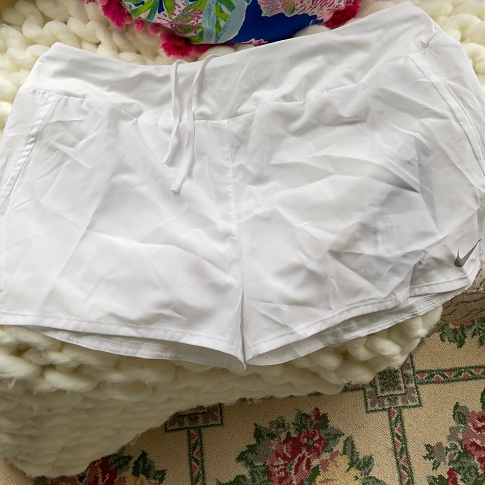 Women’s white Nike athletic shorts